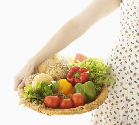 Woman with Basket of Food